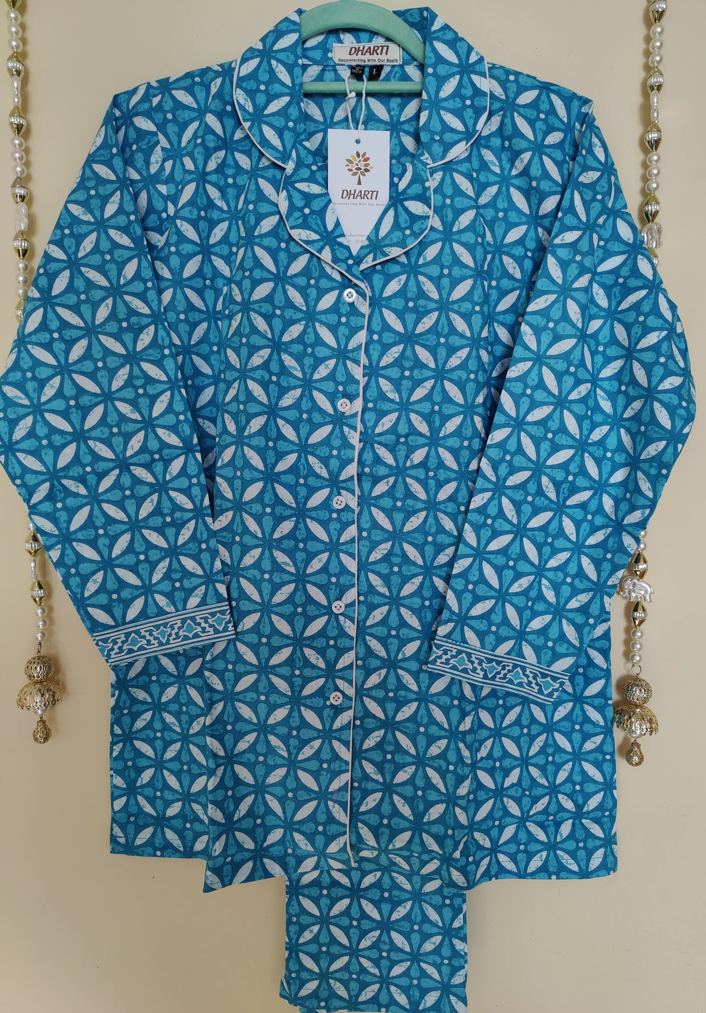 Batiq handprinted azure blue pyjama set on hanger