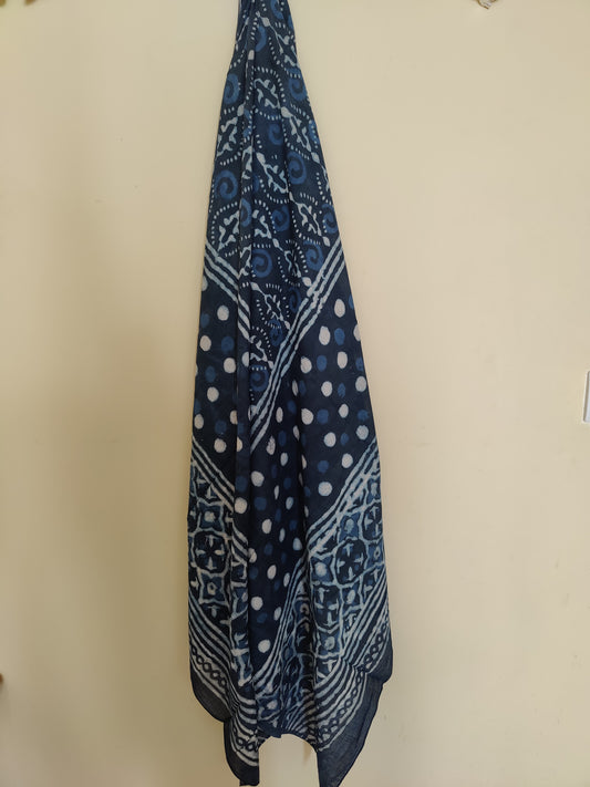 Indigo scarf hanging on a wall