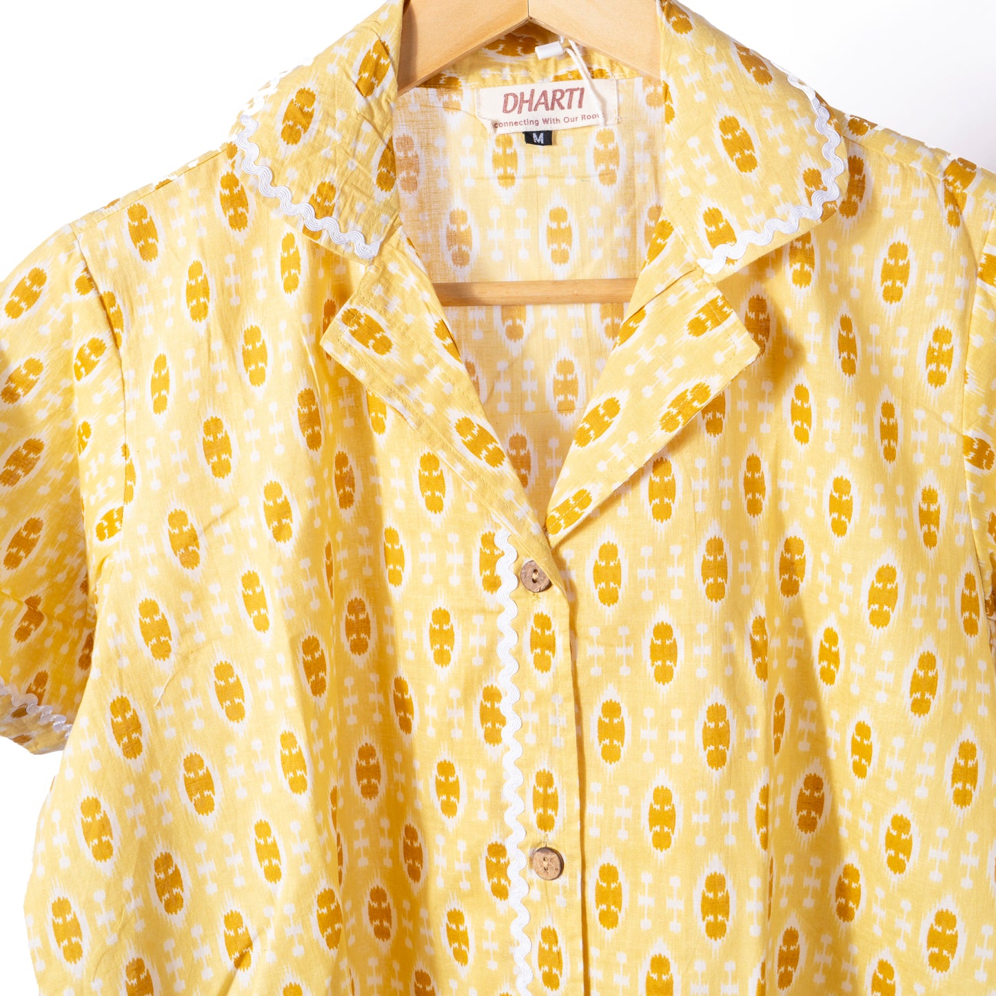 yellow ikat print shirt with ric rac trimming